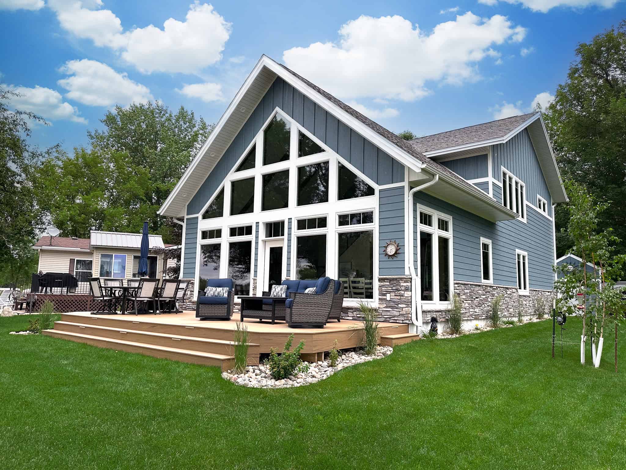 Bossert Home on Lake Lida • lakeside exterior wider view