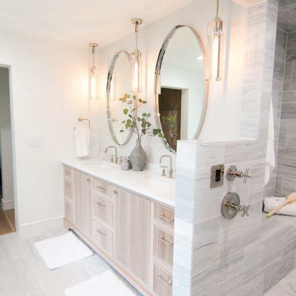 Zunich Home on Detroit Lake master bathroom mirrors and vanity near shower area