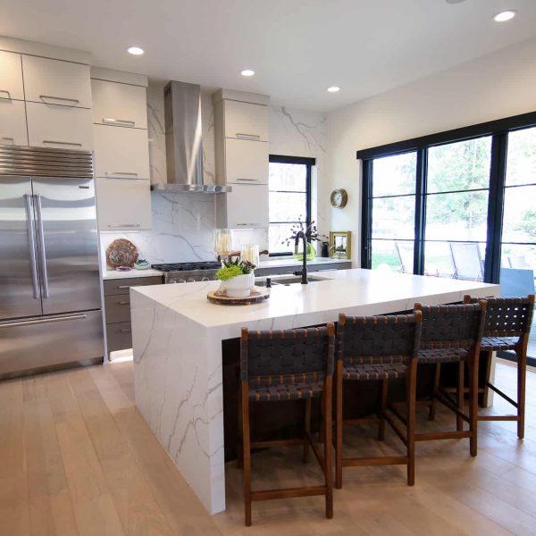Newman Home on Lake Eunice, MN • kitchen island with chairs