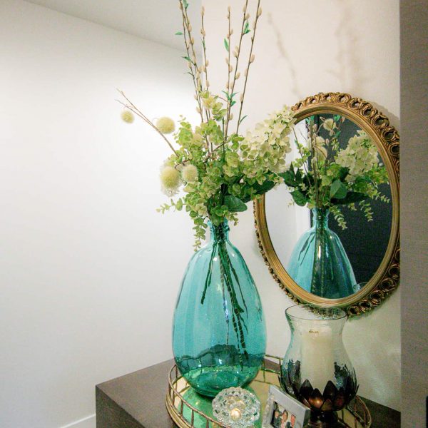 Newman Home on Lake Eunice, MN • garage entry floral arrangement