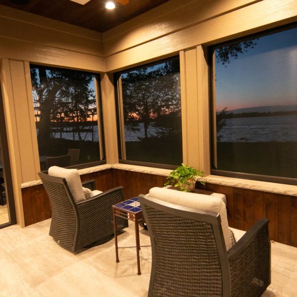 Newman Home on Lake Eunice, MN • seasonal porch evening exterior view
