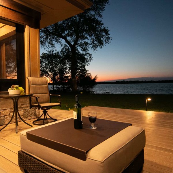 Newman Home on Lake Eunice, MN • evening exterior view on deck