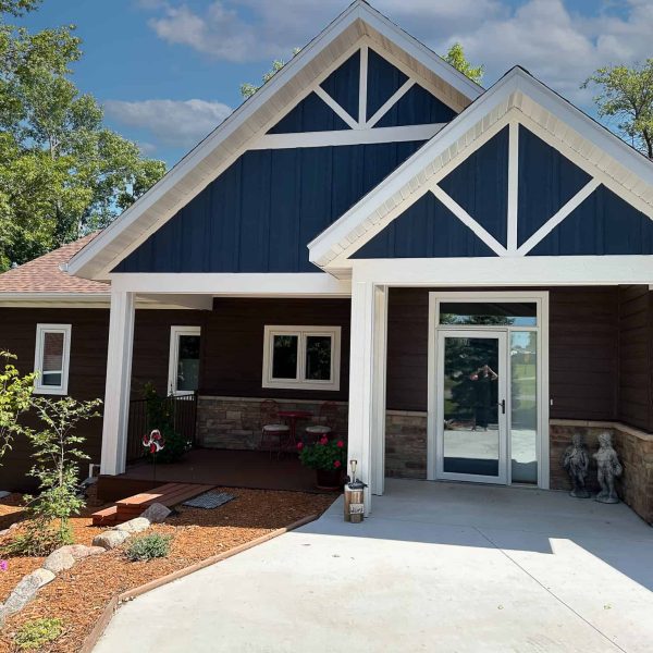 Schaefbauer home on Munson Lake roadside exterior entry door