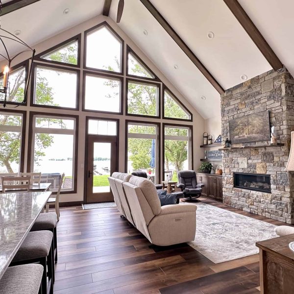 Bossert Home on Lake Lida • the Great Room with view of the fireplace and lakeside from the kitchen