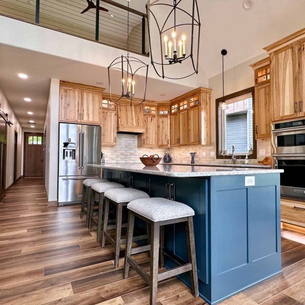 Bossert Home on Lake Lida • the Great Room kitchen area featuring island and cabinets