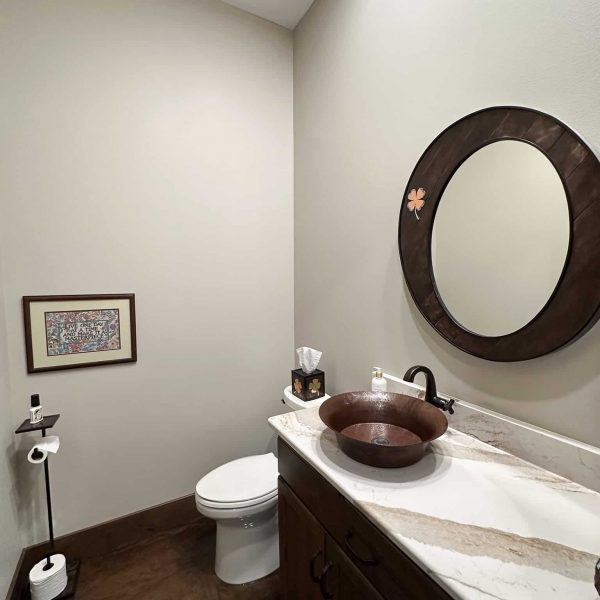 Spicer Home on Pelican Lake • Hallway bathroom vanity and toilet area