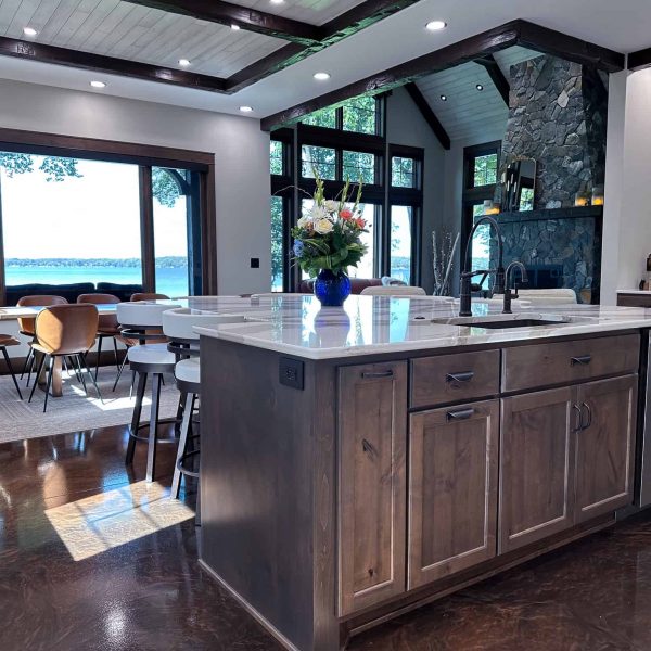 Spicer Home on Pelican Lake island wood cabinets with lake view through the dining room window