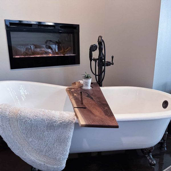 Spicer Home on Pelican Lake • Feminine Master Bedroom • claw tub with fireplace in the background