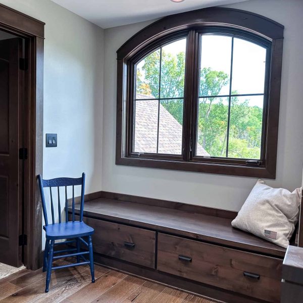 Spicer Home on Pelican Lake • window seat with cabinet foundation in the upper level of the home