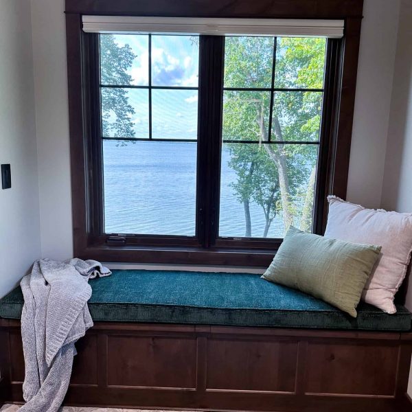 Spicer Home on Pelican Lake • Guest room window seat with view of the lake