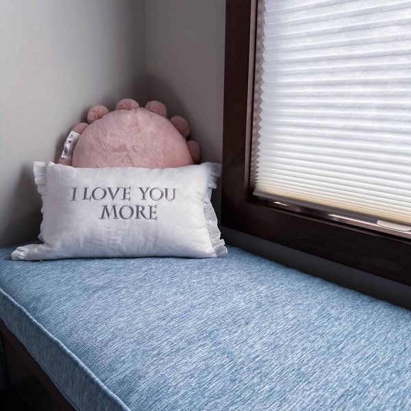 Spicer Home on Pelican Lake • Guest room window seat with "Love You More" decorative pillow