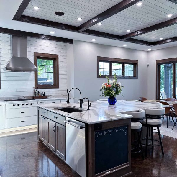 Spicer Home on Pelican Lake kitchen • side view of island with appliance and chalkboard sides