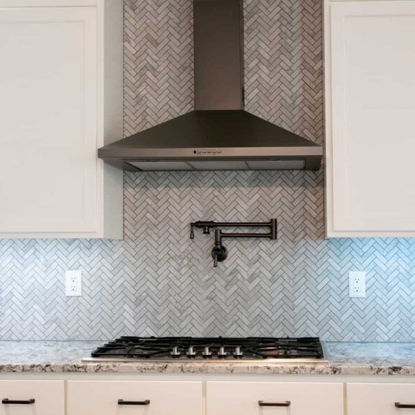 Dagenais Custom Built Home ∙ Gas Cooktop & Hood