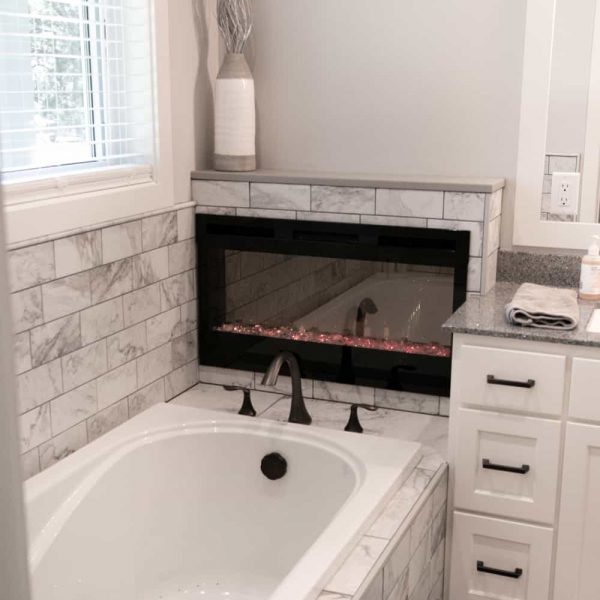 Dagenais Custom Built Home ∙ Master Bathroom Fireplace