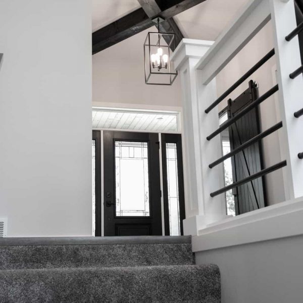 Dagenais Custom Built Home ∙ Basement Stairway View of Entryway