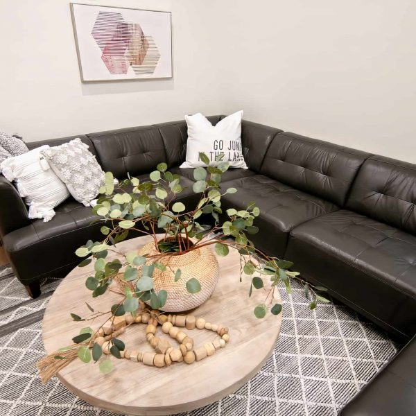 Zunich Home on Detroit Lake family room/den with coffee table and sectional couch