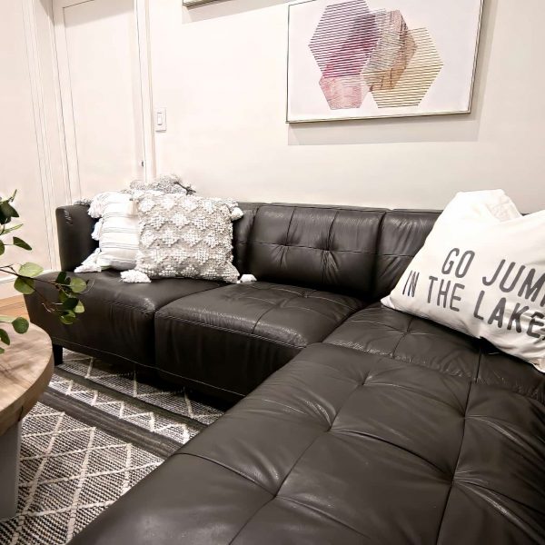 Zunich Home on Detroit Lake family room/den with coffee table and sectional couch