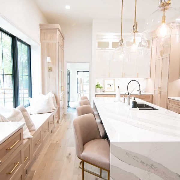 Zunich Home on Detroit Lake kitchen with island and sitting area view into den