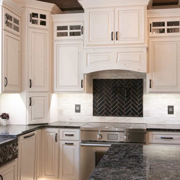 Briard Construction Model Home Great Room Living Room Area Stovetop & Exhaust Hood area